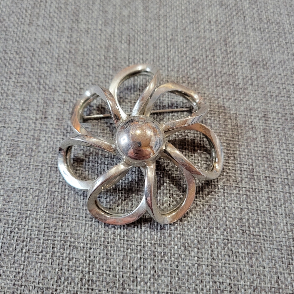 Elegant Silver Flower Brooch